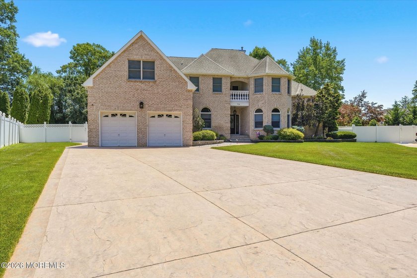 Offered for the first time, this custom-built home is nestled on - photo 3