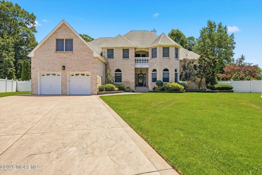 Offered for the first time, this custom-built home is nestled on - photo 4