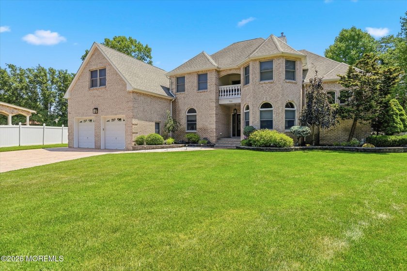 Offered for the first time, this custom-built home is nestled on - photo 5