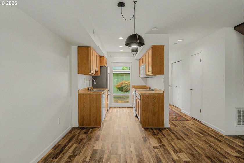 Tucked into a peaceful community surrounded by mature trees - photo 10