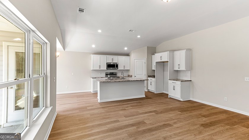 The Holly plan by Smith Family Homes is under construction in - photo 12