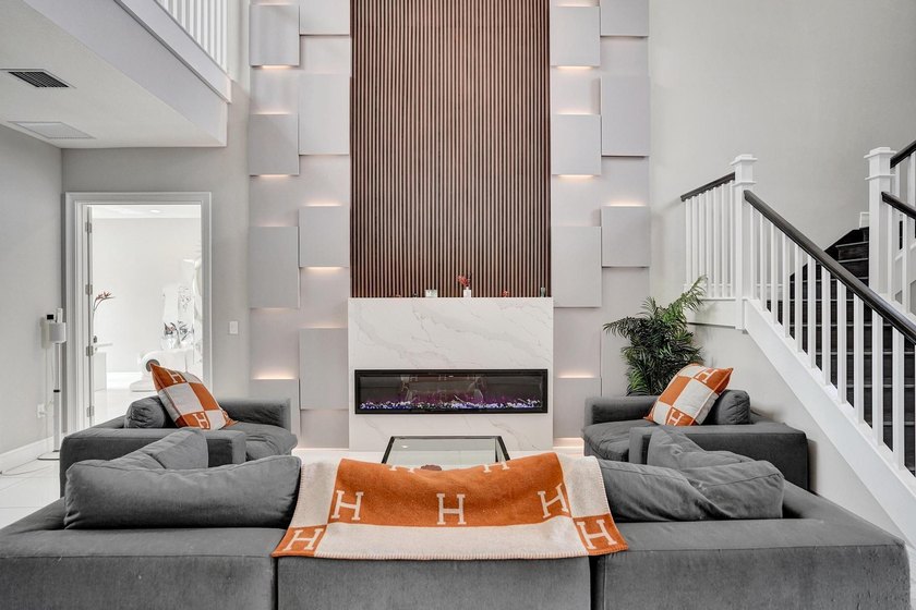 Discover elevated Florida living in this exceptional 5-bedroom - photo 13