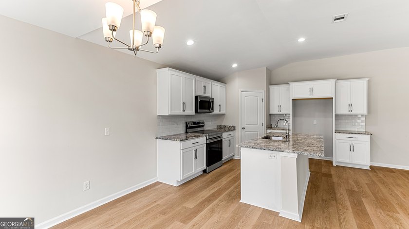 The Holly plan by Smith Family Homes is under construction in - photo 14