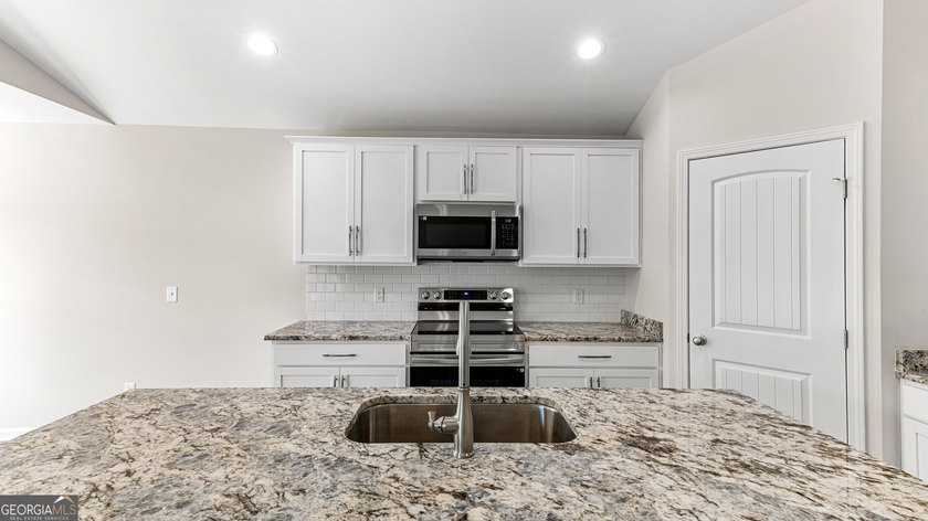 The Holly plan by Smith Family Homes is under construction in - photo 15