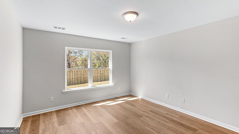 The Holly plan by Smith Family Homes is under construction in - photo 18