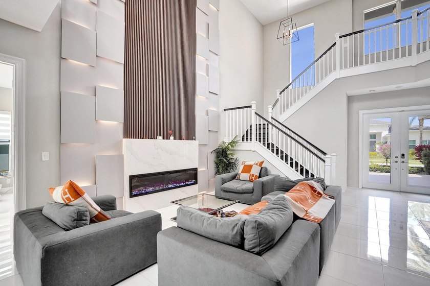 Discover elevated Florida living in this exceptional 5-bedroom - photo 19