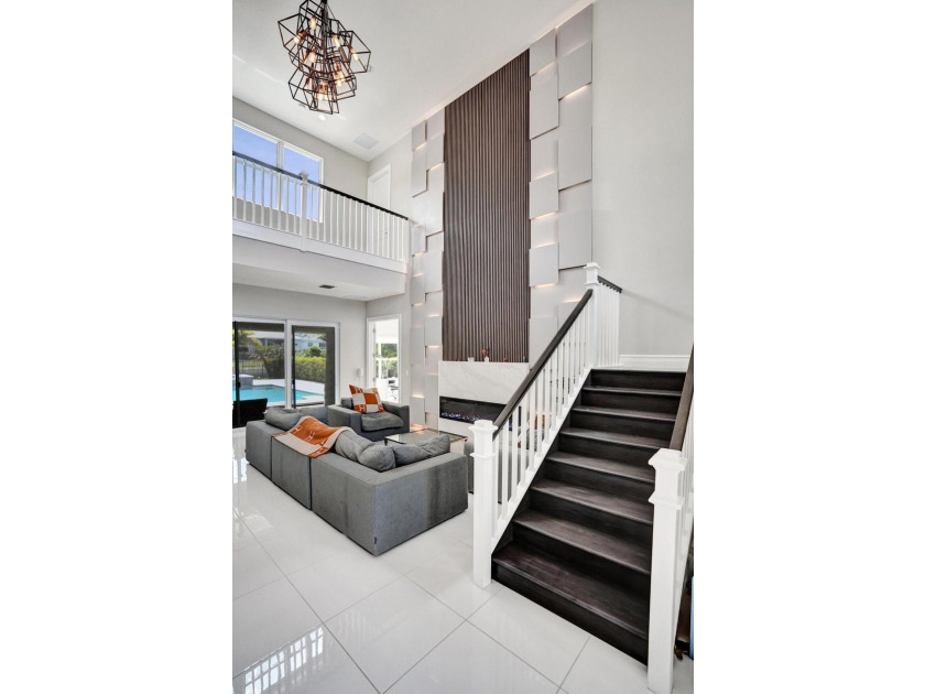 Discover elevated Florida living in this exceptional 5-bedroom - photo 25