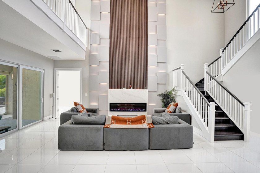 Discover elevated Florida living in this exceptional 5-bedroom - photo 27