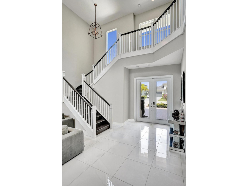 Discover elevated Florida living in this exceptional 5-bedroom - photo 28