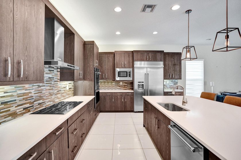 Discover elevated Florida living in this exceptional 5-bedroom - photo 29