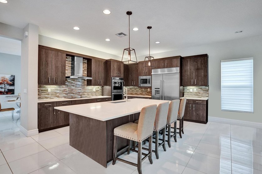 Discover elevated Florida living in this exceptional 5-bedroom - photo 30