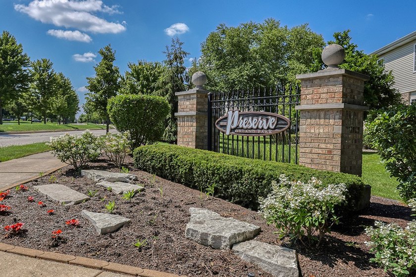 STUNNING, Ultra upgraded END UNIT RANCH townhome nestled on a - photo 32