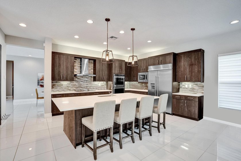 Discover elevated Florida living in this exceptional 5-bedroom - photo 32