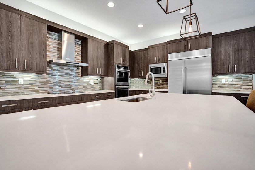 Discover elevated Florida living in this exceptional 5-bedroom - photo 34