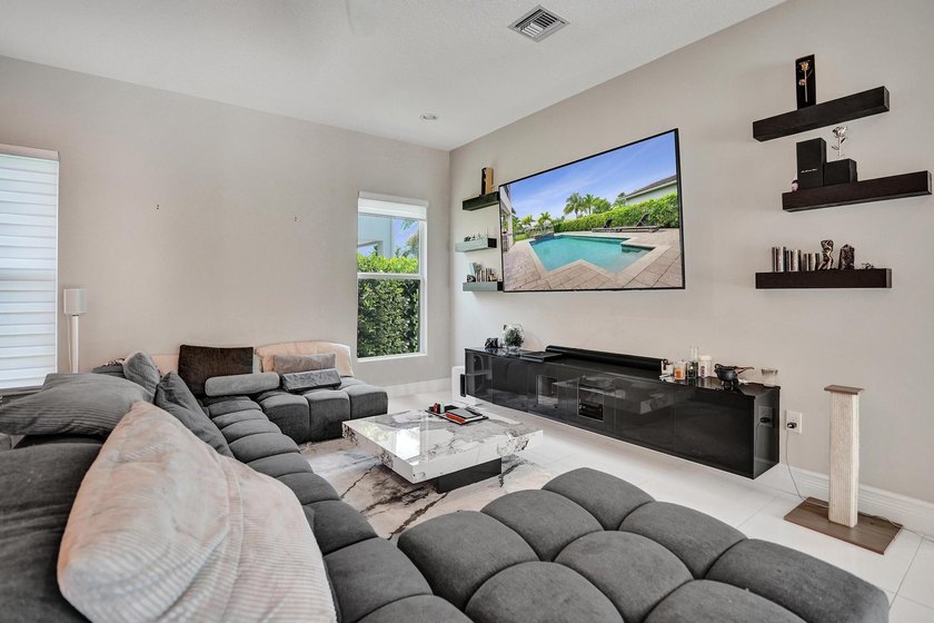 Discover elevated Florida living in this exceptional 5-bedroom - photo 36