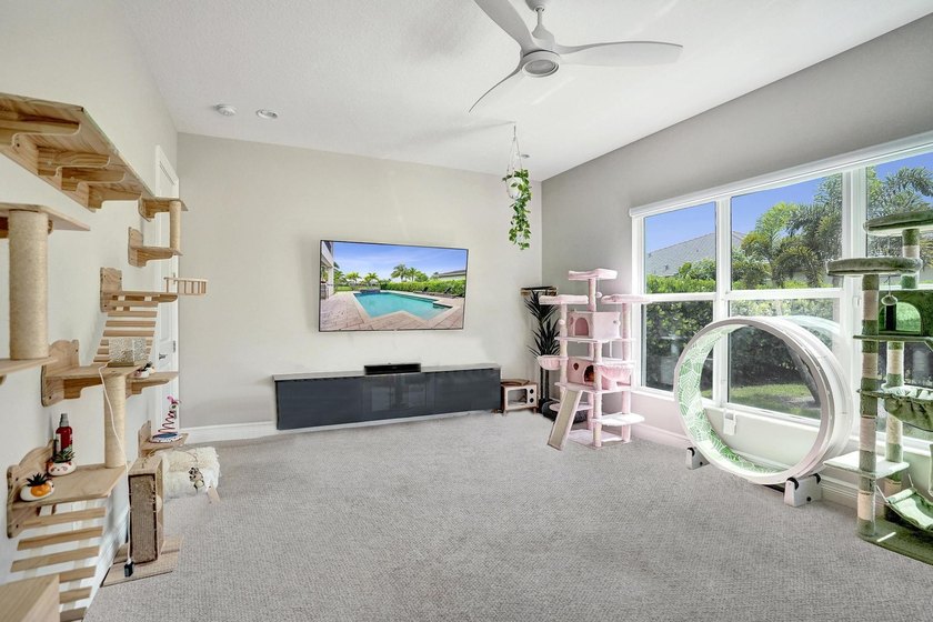 Discover elevated Florida living in this exceptional 5-bedroom - photo 37