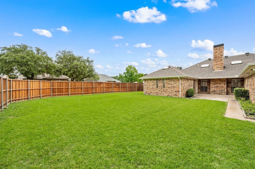 Welcome home to this beautiful 4 bedroom, 3 bathroom 1 story - photo 39
