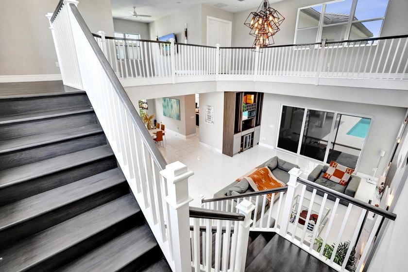 Discover elevated Florida living in this exceptional 5-bedroom - photo 40