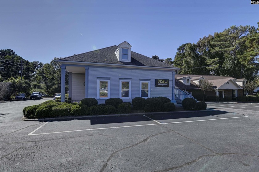 This well-maintained 3,500+/- square foot office building with - photo 3