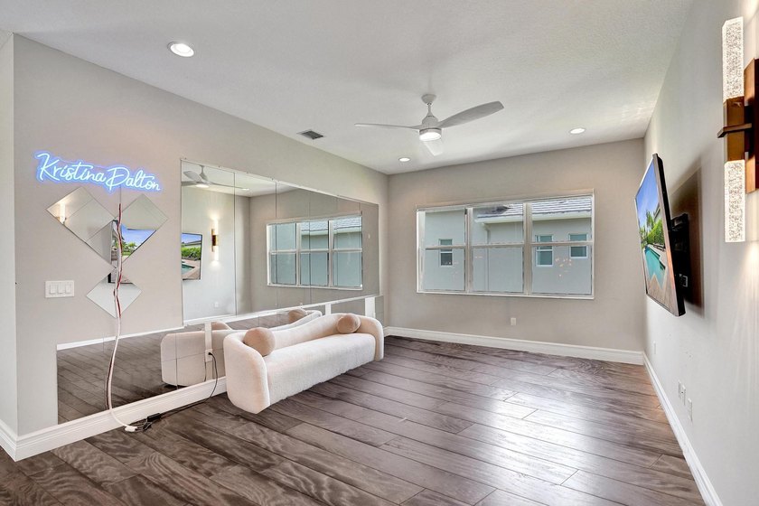 Discover elevated Florida living in this exceptional 5-bedroom - photo 44