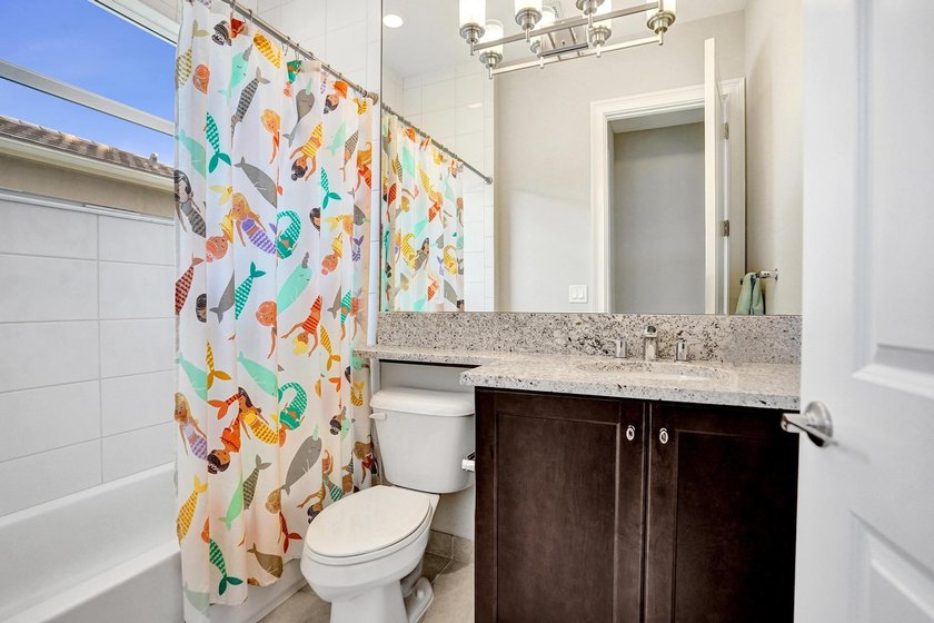 Discover elevated Florida living in this exceptional 5-bedroom - photo 46