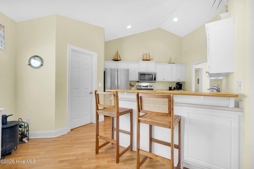 Light-filled, airy, and designed for easy coastal living, this - photo 11