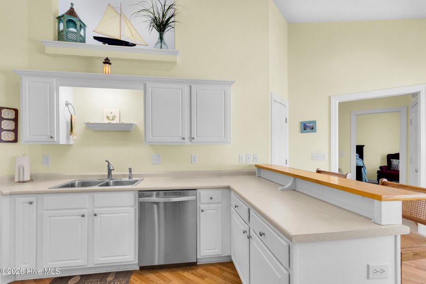 Light-filled, airy, and designed for easy coastal living, this - photo 12