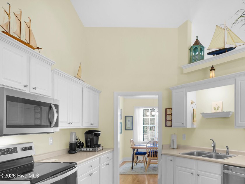 Light-filled, airy, and designed for easy coastal living, this - photo 13