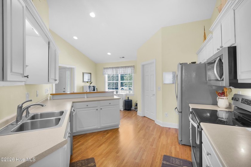 Light-filled, airy, and designed for easy coastal living, this - photo 14
