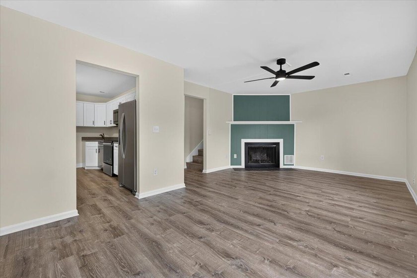 Welcome home to 4354 Great Oak Drive, a beautifully refreshed - photo 4