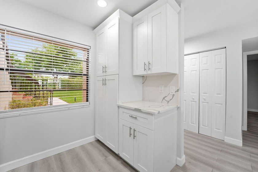FULLY RENOVATED, 1st-FLOOR, LAKE FRONT condo located in the - photo 6