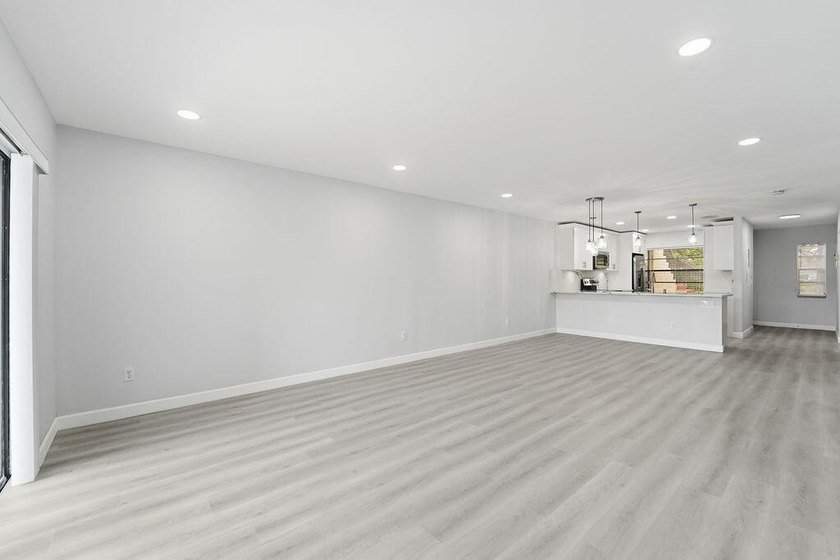 FULLY RENOVATED, 1st-FLOOR, LAKE FRONT condo located in the - photo 8