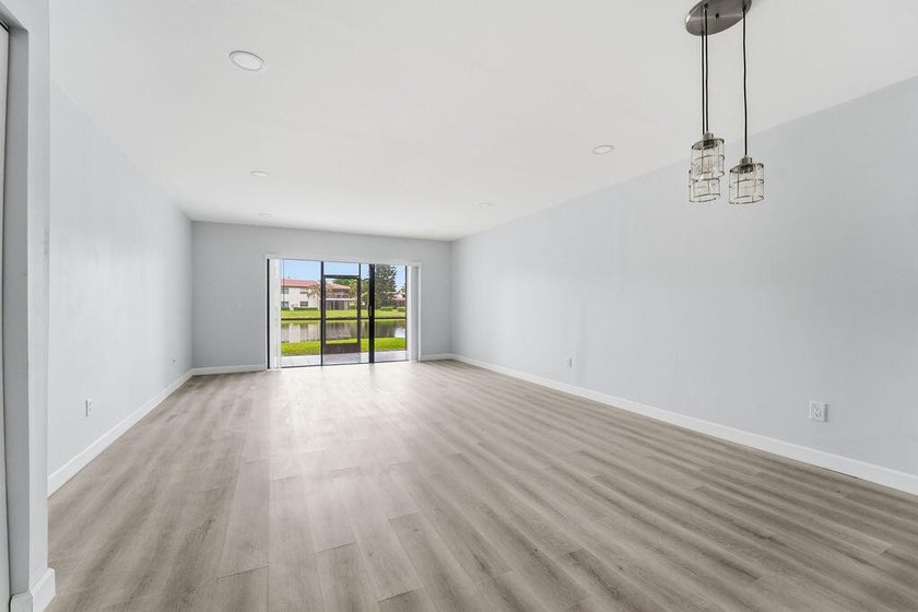 FULLY RENOVATED, 1st-FLOOR, LAKE FRONT condo located in the - photo 9