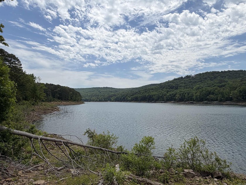 Escape to a truly remote lakeside hideaway spanning 5 acres and - photo 2