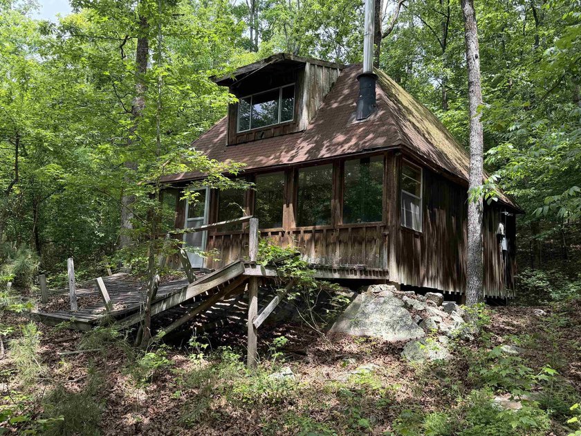 Escape to a truly remote lakeside hideaway spanning 5 acres and - photo 7