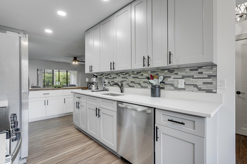 This stunning two-story residence has been completely remodeled - photo 3