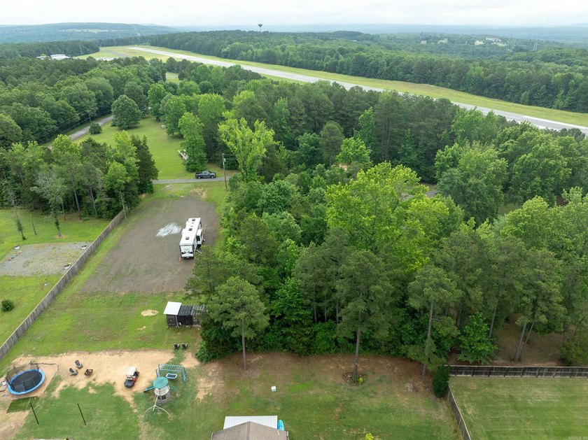 Wooded lot located on a peaceful road offering privacy and a - photo 3