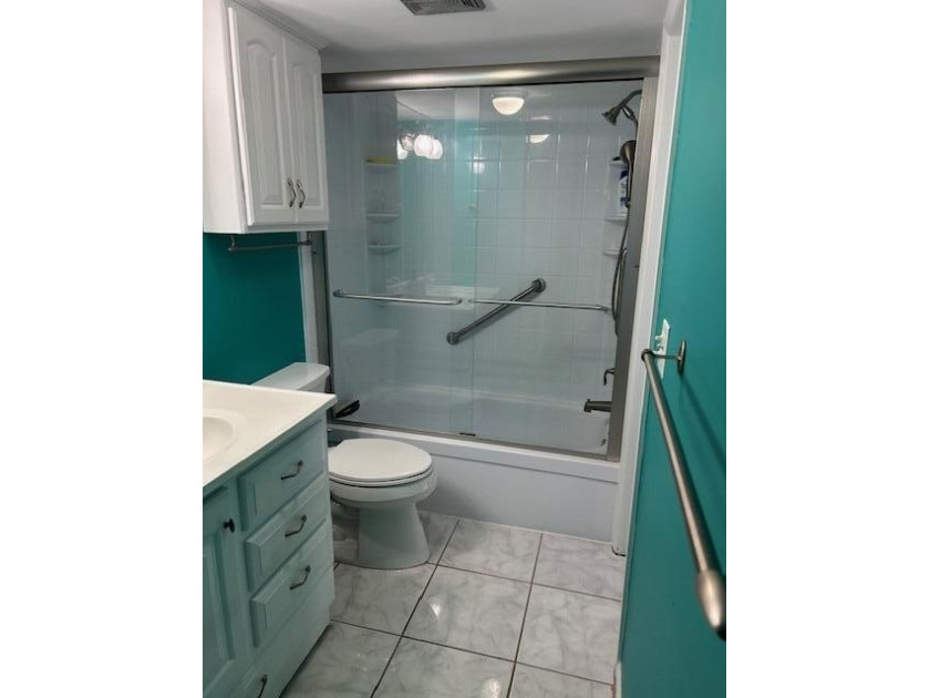 This a fantastic updated unit with 1 full bathroom and 1/2 bath - photo 17
