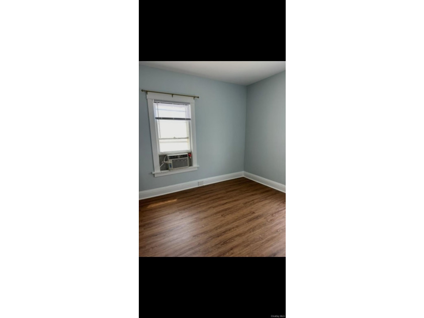Spacious two-story detached legal 2 family home on a corner lot - photo 15