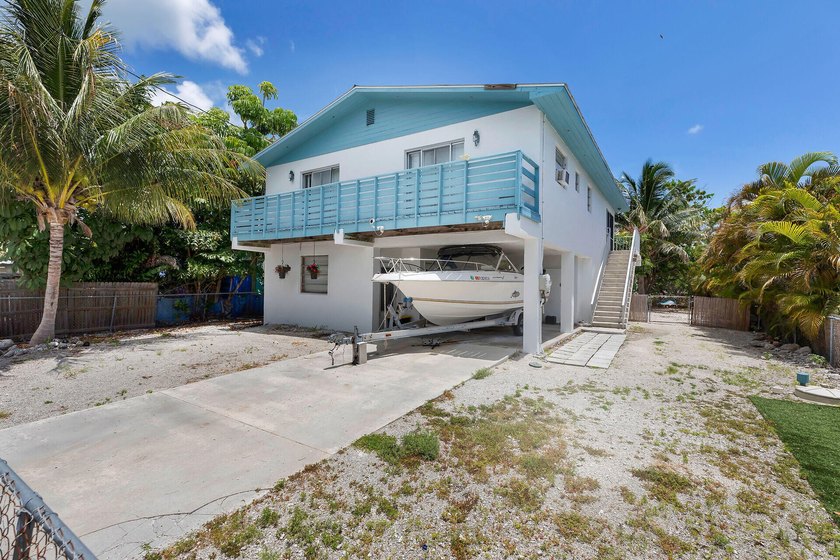 Are you looking for a canal-front home that could use your TLC? - photo 4