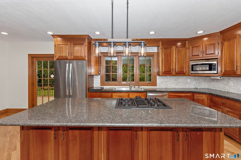 Welcome to this beautiful, private retreat at 15 Woodland Drive - photo 12