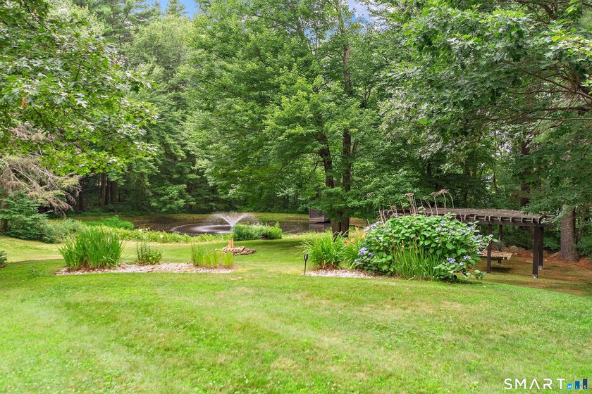 Welcome to this beautiful, private retreat at 15 Woodland Drive - photo 32