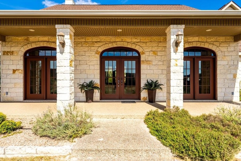 Nestled in the rolling hills of the Texas Hill Country, custom - photo 2