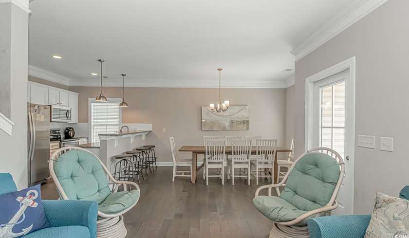 This very open and spacious 5-Bedroom, 5-Bath raised beach house - photo 6