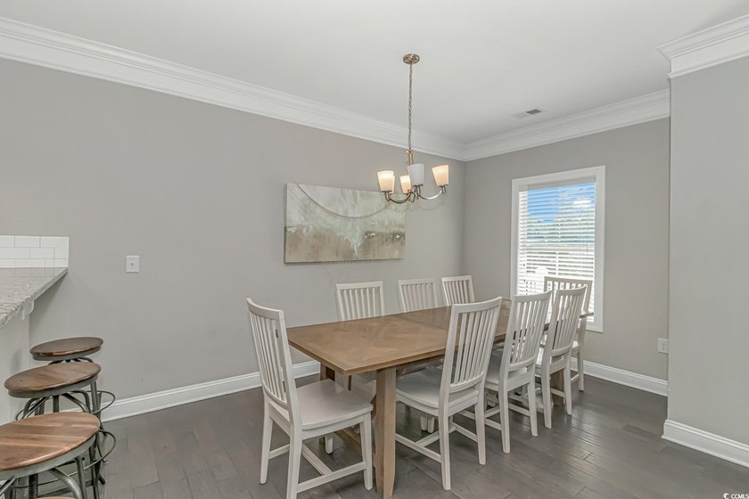 This very open and spacious 5-Bedroom, 5-Bath raised beach house - photo 7