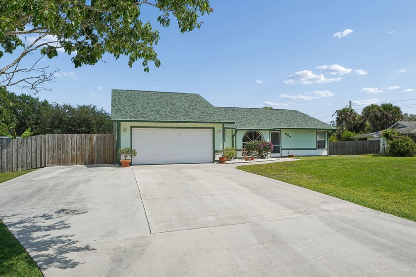 Welcome to 902 Egret Avenue in Fort Pierce! Tucked away on a - photo 2