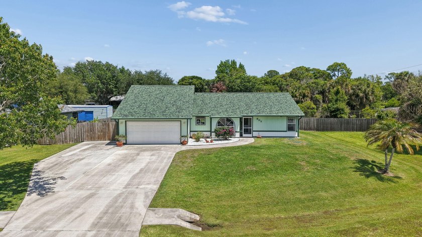 Welcome to 902 Egret Avenue in Fort Pierce! Tucked away on a - photo 3