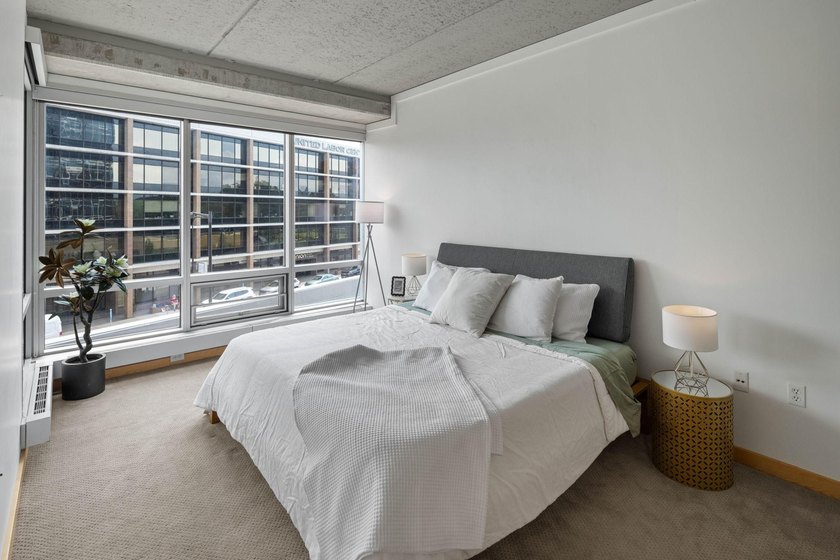 Wake up to beautiful sunrises in this bright, East-facing condo - photo 12
