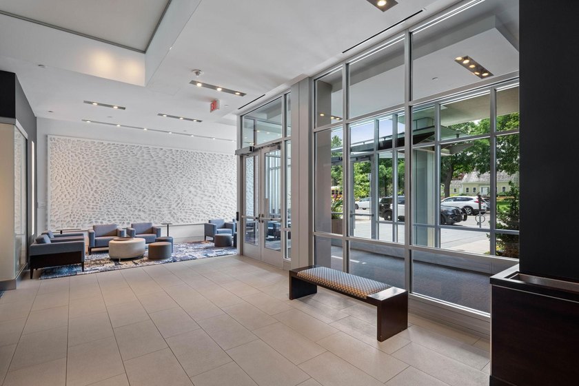 Wake up to beautiful sunrises in this bright, East-facing condo - photo 22