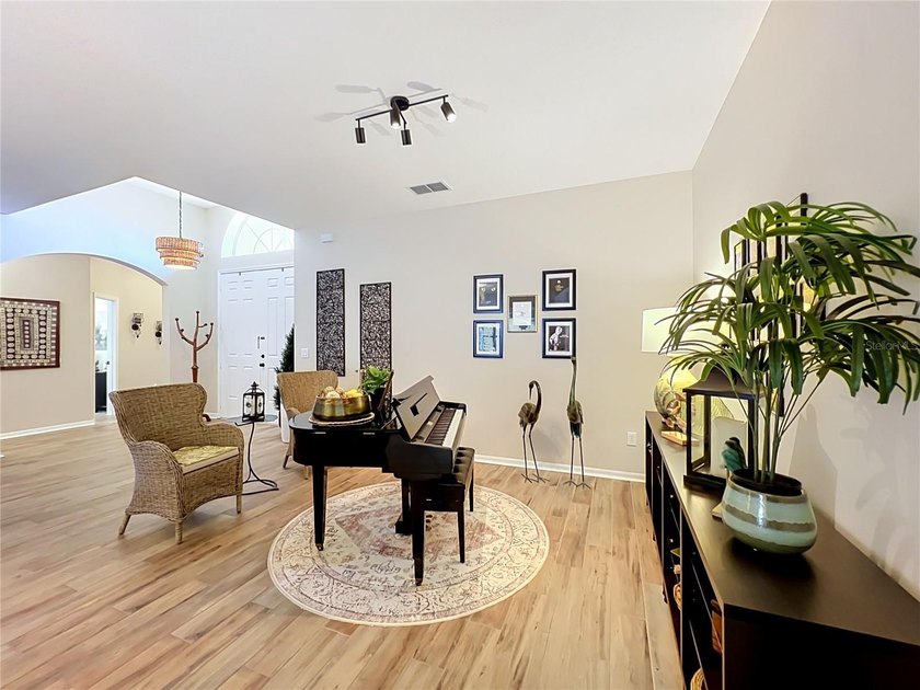 As you enter the Home you will notice the open floor plan, with - photo 3